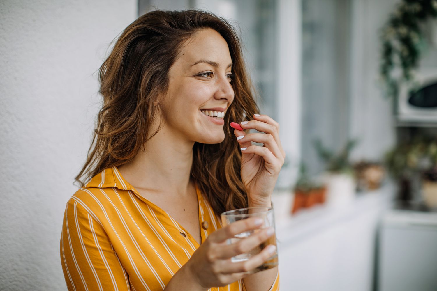 Woman taking supplements